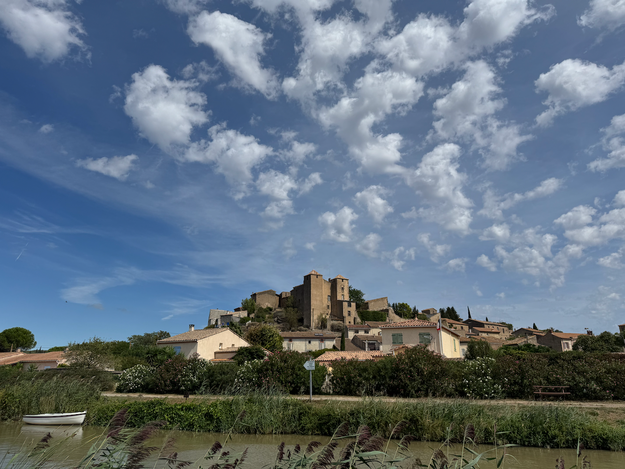 View across the canal to a hill town